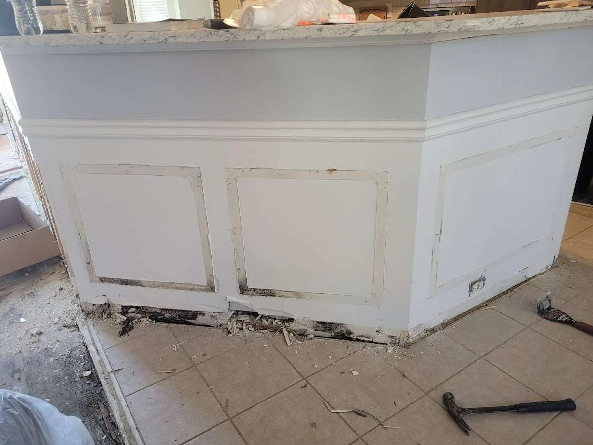 Water damage and mold on kitchen during Storm Damage Restoration in Rainbow Springs